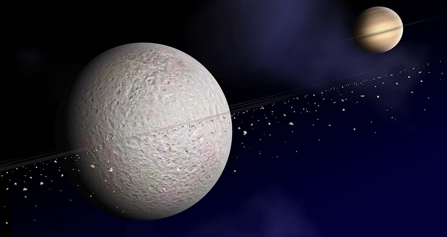 This is an artist's concept of the ring of debris that may orbit Saturn's second-largest moon, Rhea