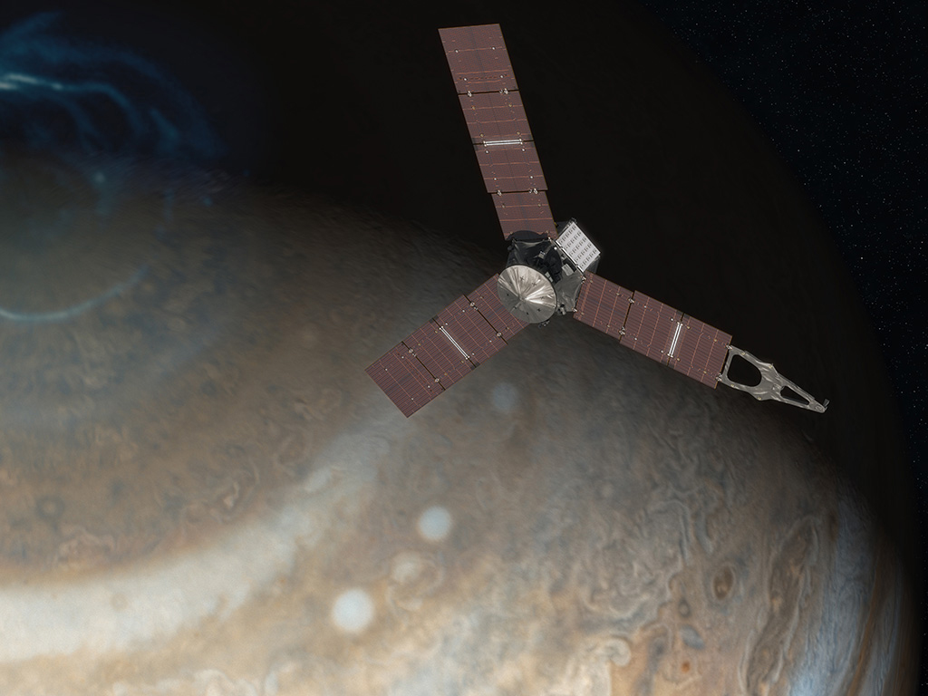 This artist’s concept depicts NASA’s Juno spacecraft above Jupiter’s north pole