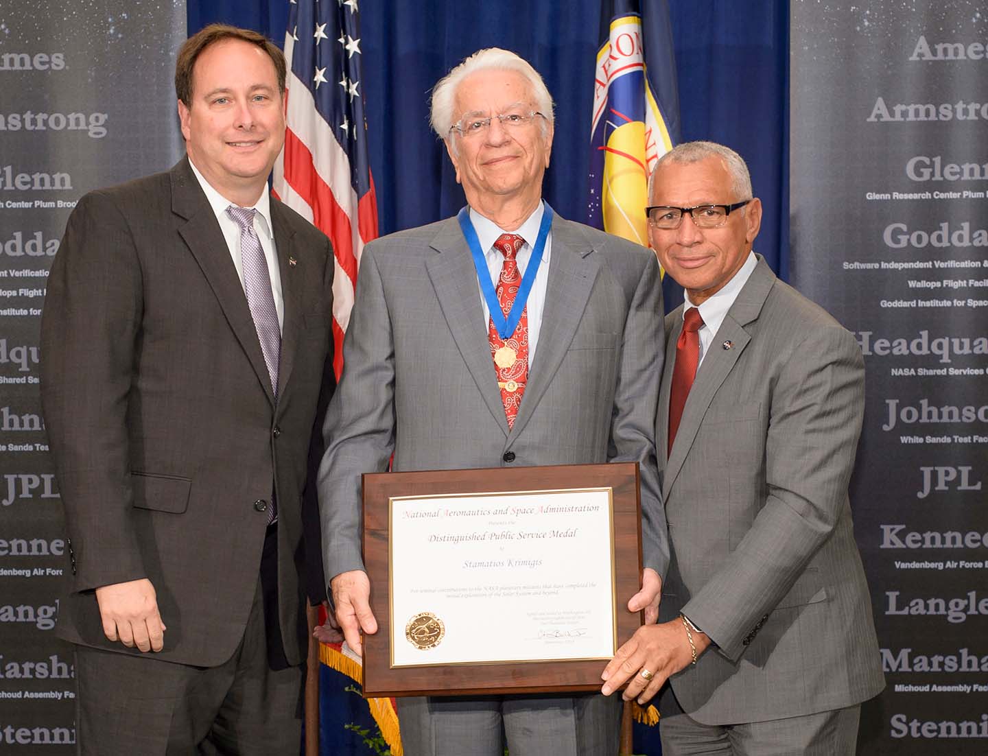 APL’s Tom Krimigis (center) receives the NASA Distinguished Public Service Medal from Associate Administrator Robert Lightfoot (left) and Administrator Charlie Bolden (right)