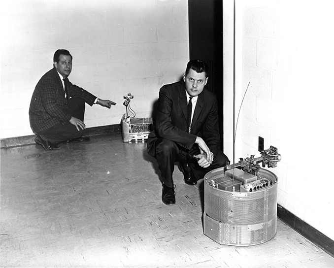 John Chubbuck (right) with "the Hopkins Beast" and Leonard Scheer with "Ferdinand," early APL robots, or "automatons."