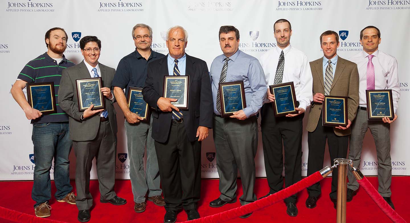 Pictured, from left to right, are Conor Scott, Mason Baron, Mark Swana, Mike Delaney, Larry Nemsick, Weston Boyd, Nicholas Francoski and Scott Heitkamp.
