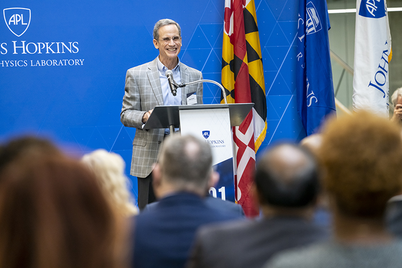 Director Ralph Semmel delivers welcome remarks at Building 201’s grand opening ceremony on Oct. 19. The ceremony featured remarks from Semmel, Maryland Gov. Larry Hogan, U.S. Rep. John Sarbanes, Howard County Executive Calvin Ball, Johns Hopkins University President Ron Daniels and APL Board of Managers Chair Heather Murren.  Credit: Johns Hopkins APL/Craig Weiman
