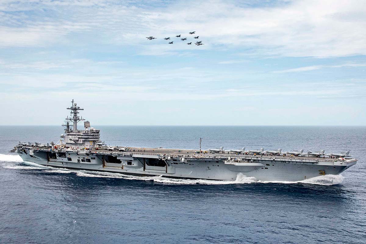 Aircraft assigned to Carrier Air Wing (CVW) 8 and the French Carrier Air Wing fly over the aircraft carrier USS George H.W. Bush (CVN 77) (Credit: U.S. Navy/MC3 Brooke Macchietto)