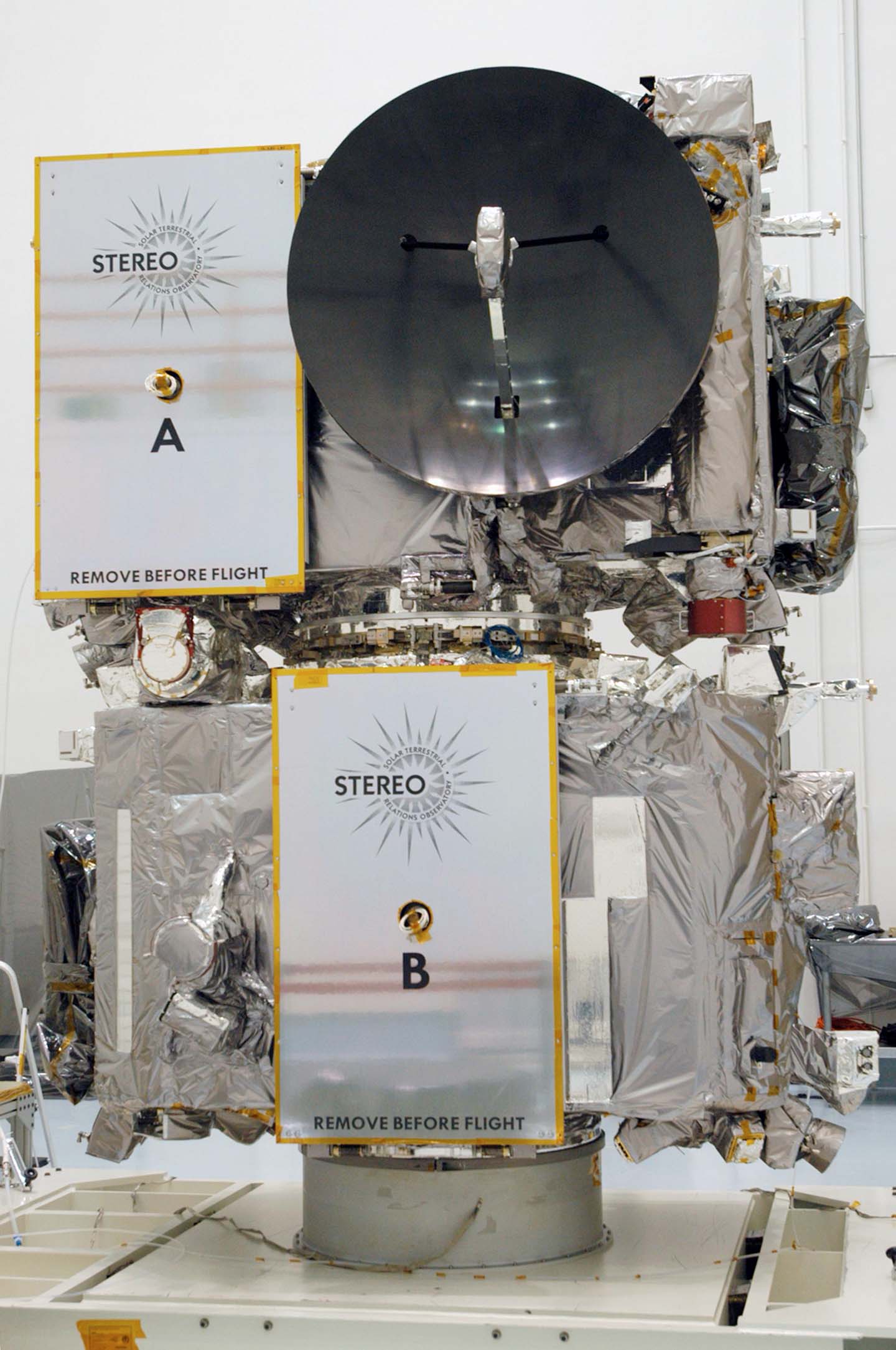 The STEREO spacecraft sits on a test stand inside the Astrotech facility in Titusville, Florida,