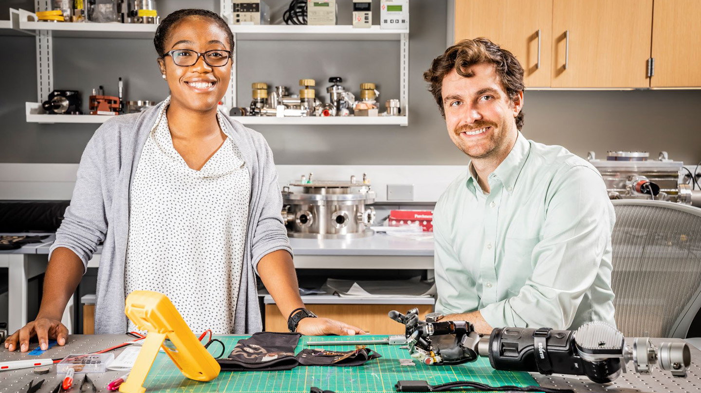 Korine Ohiri (left) and Luke Osborn lead a project team aiming to embed multilayered tactile sensors to enhance robotic systems.