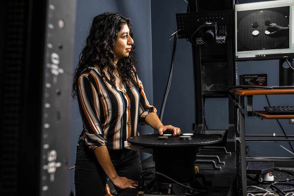 APL staff member reviews research on a monitor