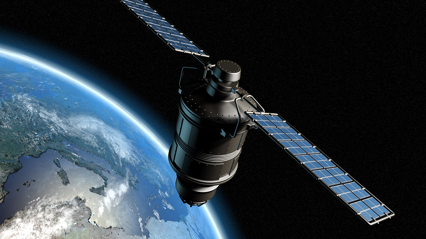 3D concept of a communications satellite orbiting Earth (Credit: Bigstock)