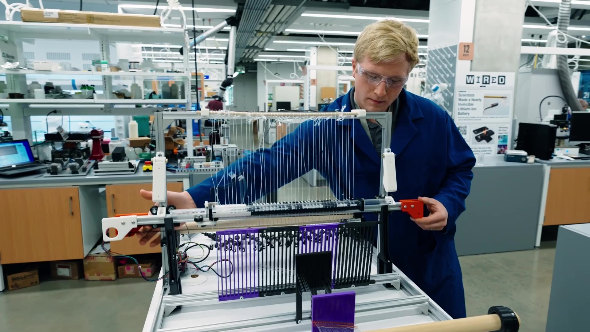 An APL researcher works in a lab.